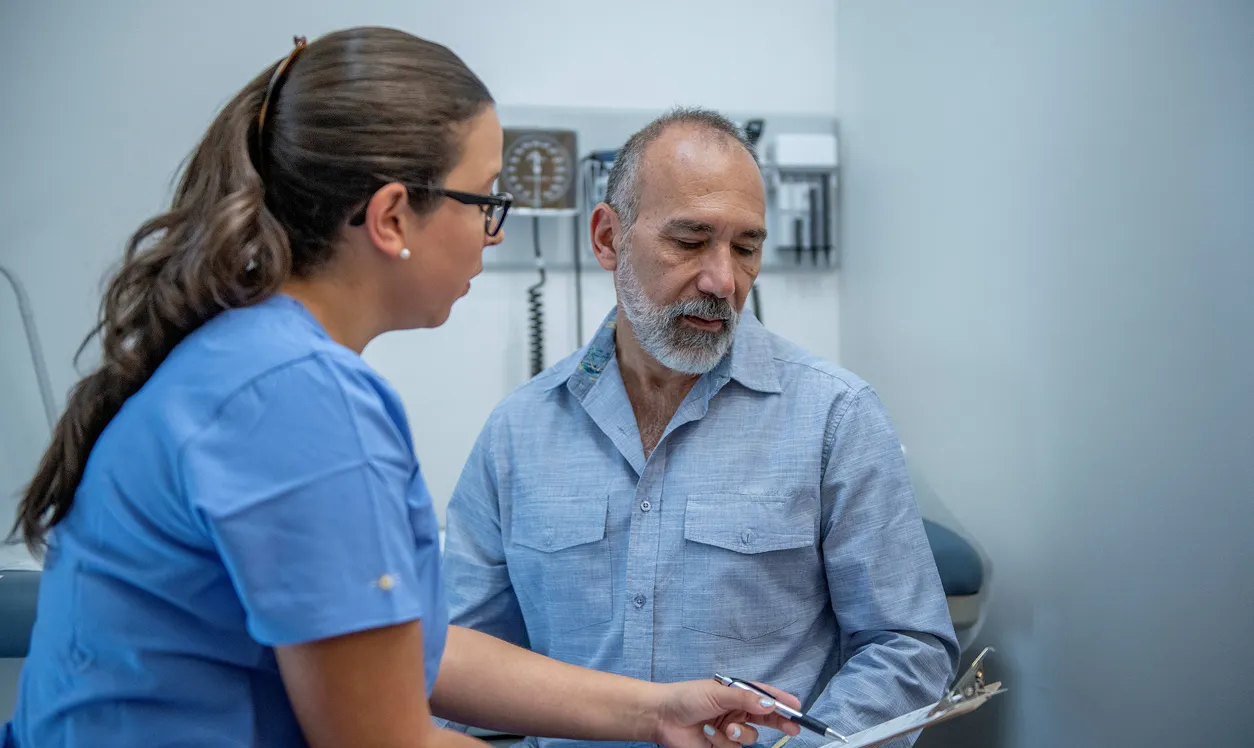 Patient consulting with a healthcare professional about CLL treatment and care options